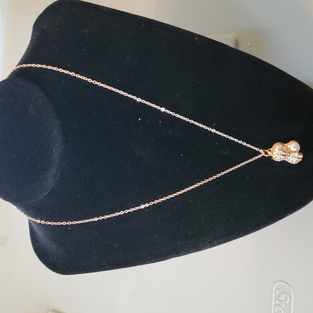 NOWT Rose gold peanut pearl necklace.